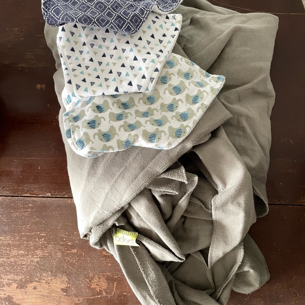 Three Velcro baby bibs